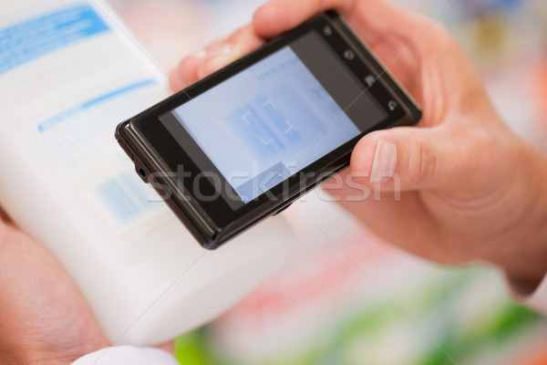 Shopper Clicking Taking Picture of Product's Information Stock photo © Kzenon