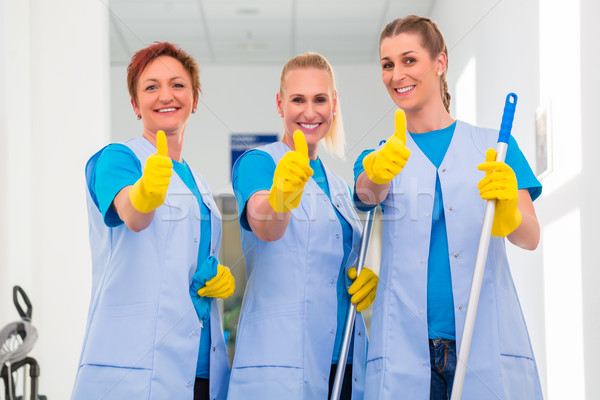 Cleaning ladies working in team Stock photo © Kzenon