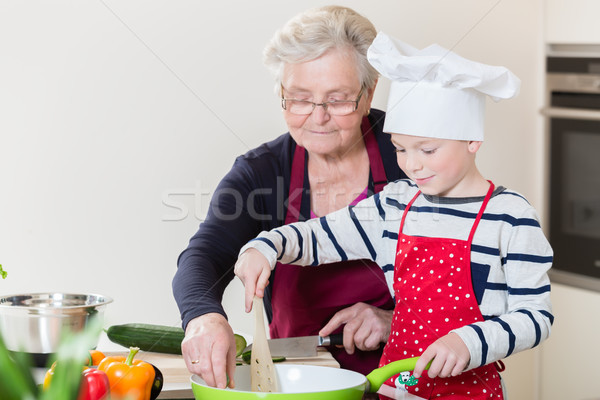 Grandma and grandson cooking together Stock photo © Kzenon