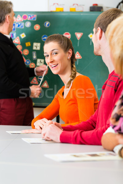 Stock photo: Driving instructor with his class