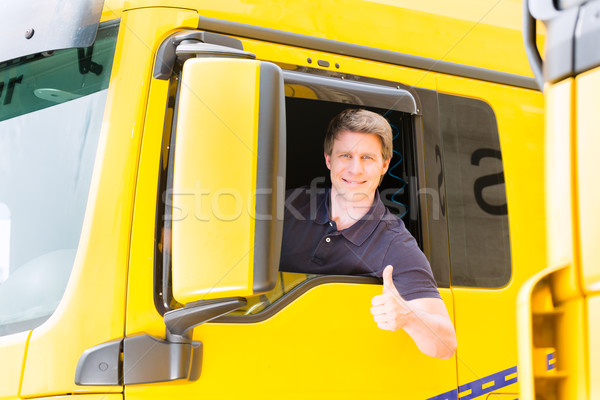 Stock photo: Forwarder or truck driver in drivers cap