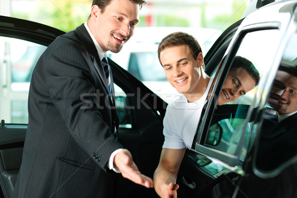 Man buying car from salesperson Stock photo © Kzenon