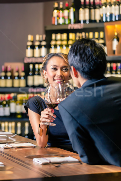 ázsiai pár iszik vörösbor kóstolás bor Stock fotó © Kzenon