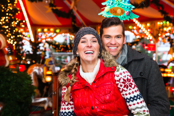 Couple during  the Christmas market or advent season Stock photo © Kzenon