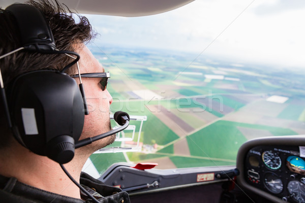 Sport piloot vliegen vliegtuig vertrouwen hemel Stockfoto © Kzenon