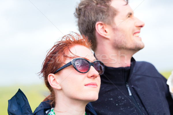 Couple in summer rain at sea coast Stock photo © Kzenon