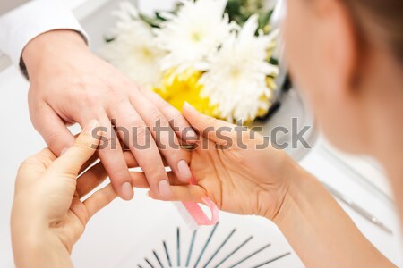 Woman at waxing hair removal in beauty parlor Stock photo © Kzenon