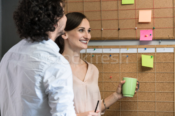 Team of agency employees in time scheduling meeting Stock photo © Kzenon