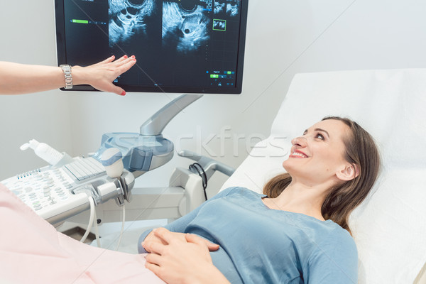 Woman at the gynecologist having ultrasonic examination Stock photo © Kzenon