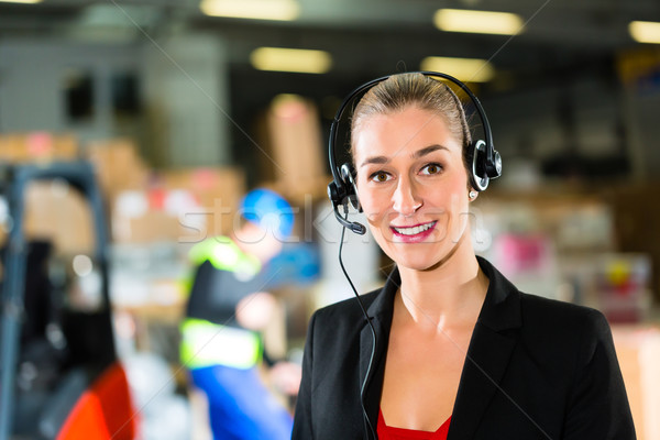 dispatcher using headset at warehouse of forwarding Stock photo © Kzenon