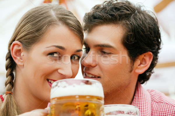 Couple in a beer tent Stock photo © Kzenon