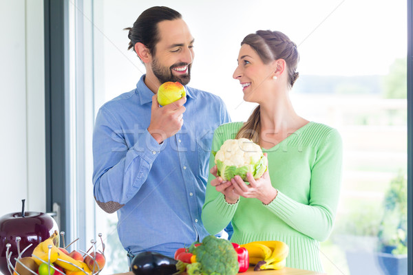 Couple living healthy eating fruits and vegetables Stock photo © Kzenon