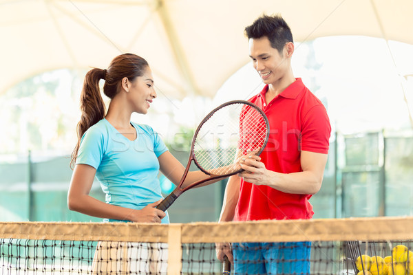 Tenisz oktató tanít kezdő játékos helyes Stock fotó © Kzenon