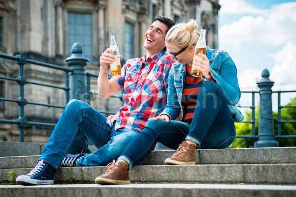 Berlin tourists enjoying view from Museum Island with beer Stock photo © Kzenon