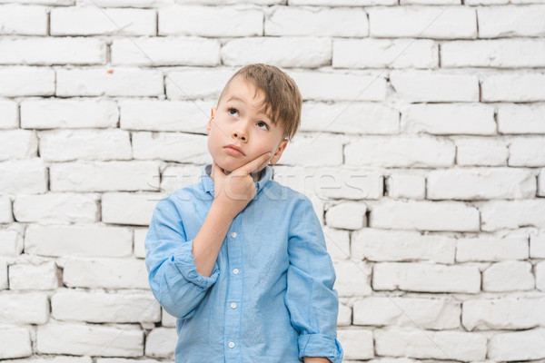 Pensive student thinking hard Stock photo © Kzenon