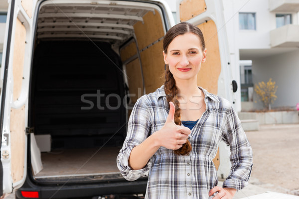 Woman in front of moving truck Stock photo © Kzenon