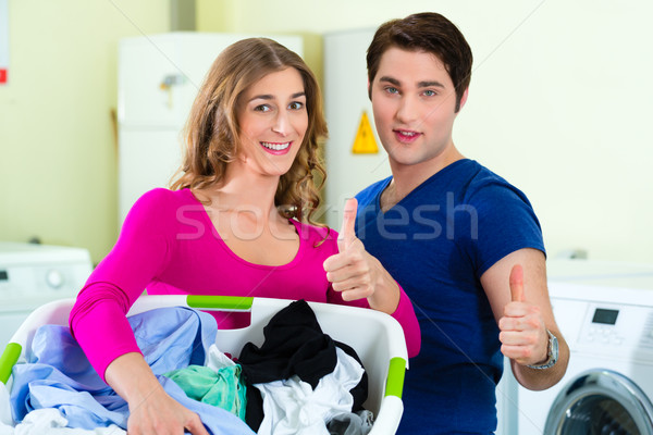 couple in a coin laundry washing Stock photo © Kzenon