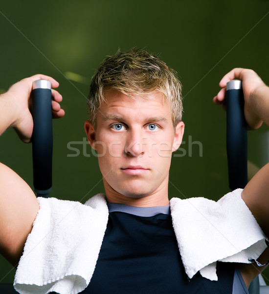 Man working out in gym Stock photo © Kzenon
