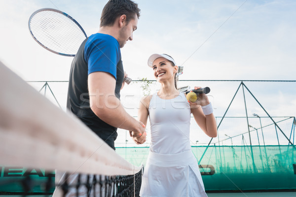 Tennis players shaking hand after match Stock photo © Kzenon
