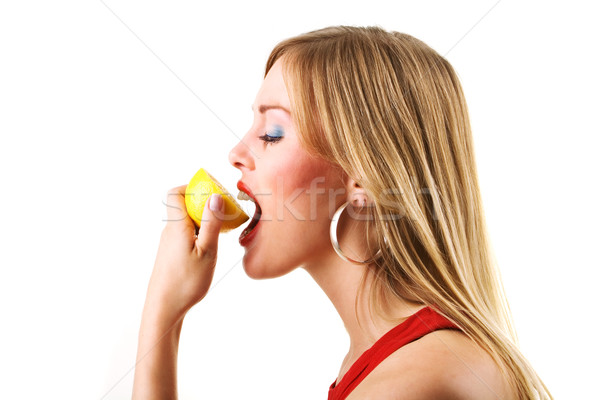 Frau Essen Zitrone Mädchen essen sauer Stock foto © Kzenon