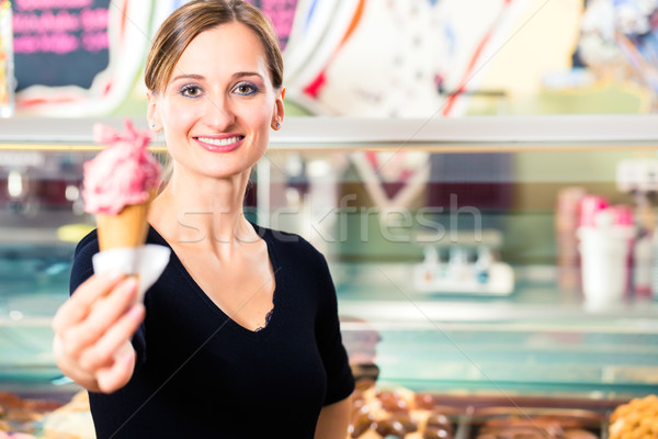 Ice-cream seller serving ice cream Stock photo © Kzenon