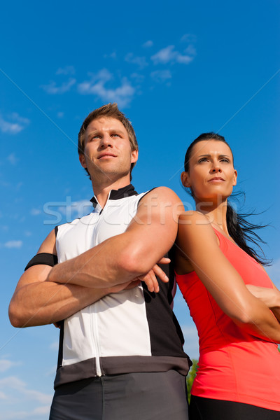 Young couple is doing sports outdoors Stock photo © Kzenon