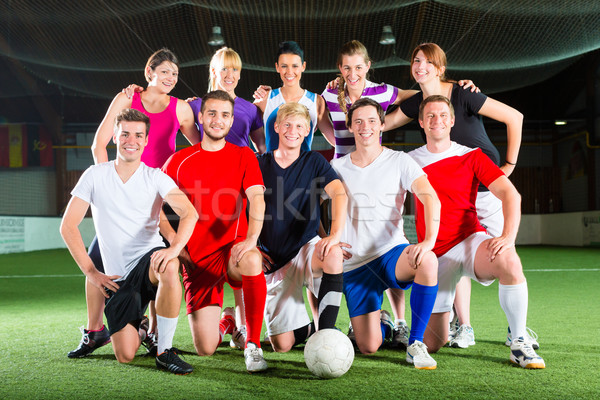 Team playing football or soccer sport indoor Stock photo © Kzenon