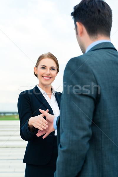 People welcoming with business handshake Stock photo © Kzenon