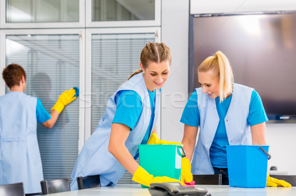 Cleaning brigade working in office Stock photo © Kzenon
