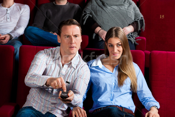 Stock photo: Couple and other people in cinema
