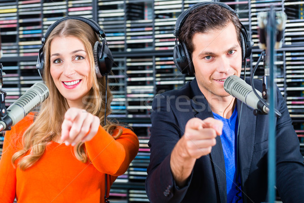 radio presenters in radio station on air Stock photo © Kzenon