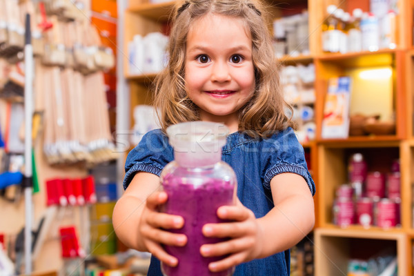 Child with color or paint pigments in store Stock photo © Kzenon