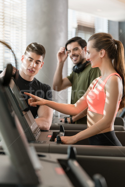 Young woman increasing the speed during a workout session Stock photo © Kzenon