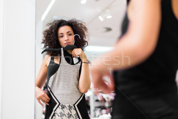 Latina Woman shopping fashion dress in store Stock photo © Kzenon