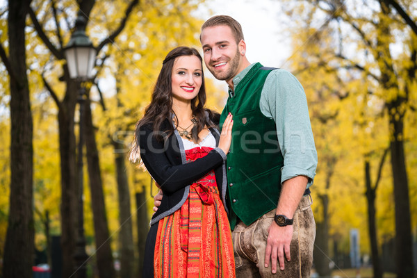 Happy Couple with Tracht in Bavaria Stock photo © Kzenon