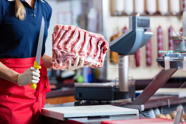 Foto stock: Carnicero · mujer · pieza · costilla · carne