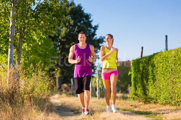 Man and woman running for sport  Stock photo © Kzenon