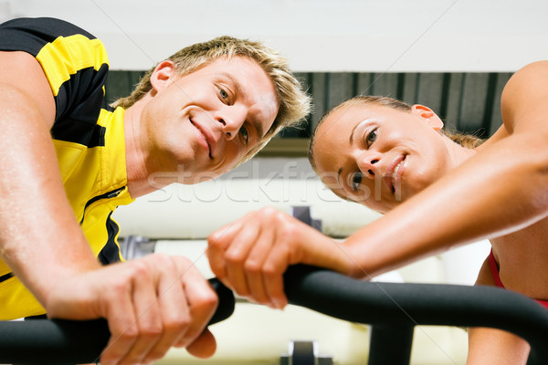 Bicycle spinning in the gym Stock photo © Kzenon