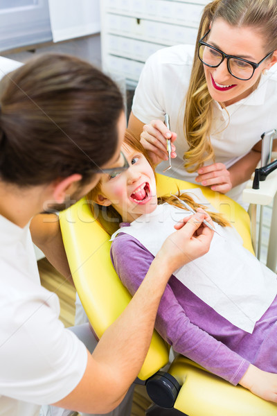 Fogorvos lány kezelés fogászati műtét iroda férfi Stock fotó © Kzenon