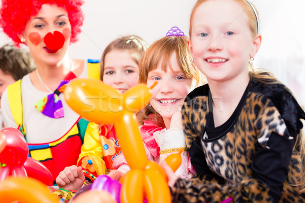 Clown at children birthday party with kids Stock photo © Kzenon