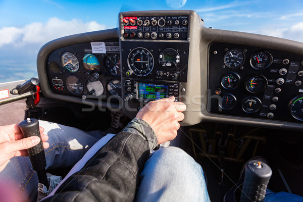 Pilot flying a private sport airplane Stock photo © Kzenon