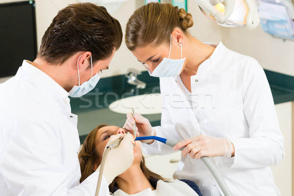 Beteg fogorvos fogászati kezelés női asszisztens Stock fotó © Kzenon