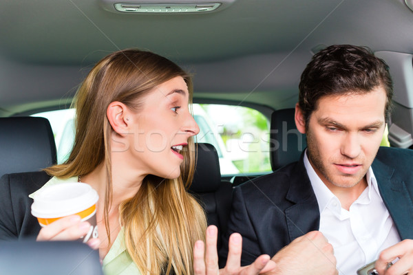 People traveling in taxi, they have an appointment Stock photo © Kzenon