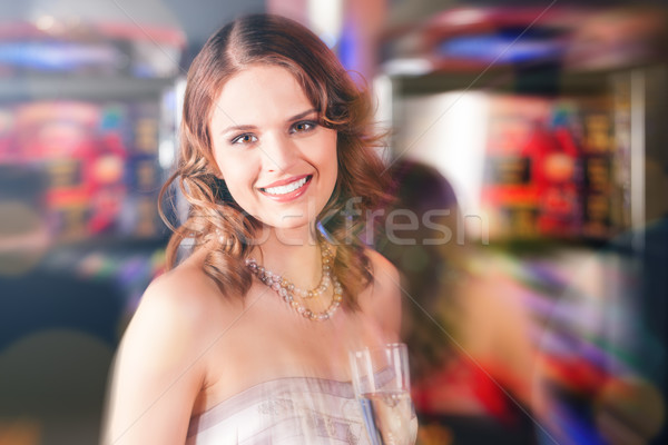 Woman in gambling in Casino Stock photo © Kzenon