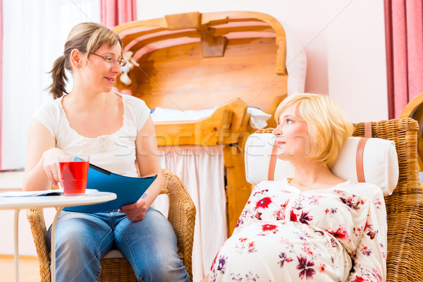 Midwife seeing pregnant mother in practice Stock photo © Kzenon