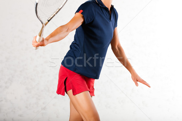 Squash racket sport in gym, woman playing Stock photo © Kzenon