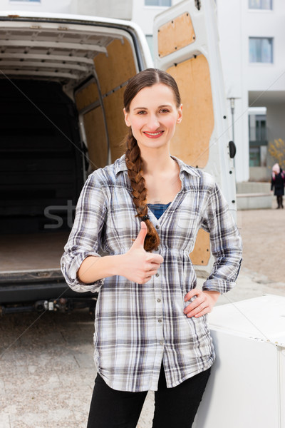 Woman in front of moving truck Stock photo © Kzenon