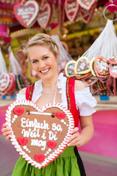 Woman in traditional Bavarian clothes or dirndl on festival Stock photo © Kzenon