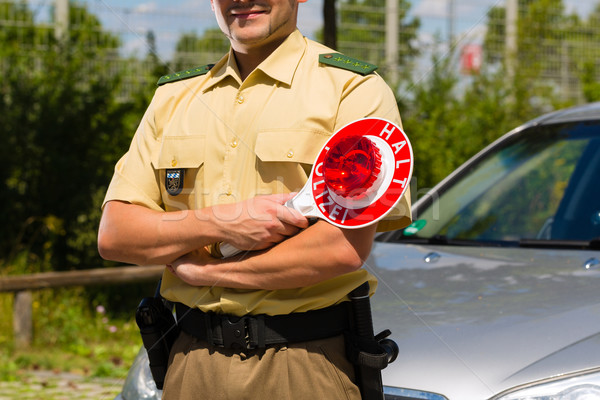 Police - policeman or cop stop car Stock photo © Kzenon