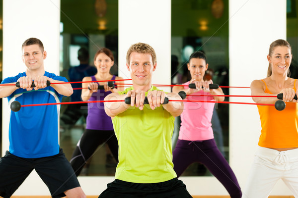 Training with flexi bar Stock photo © Kzenon